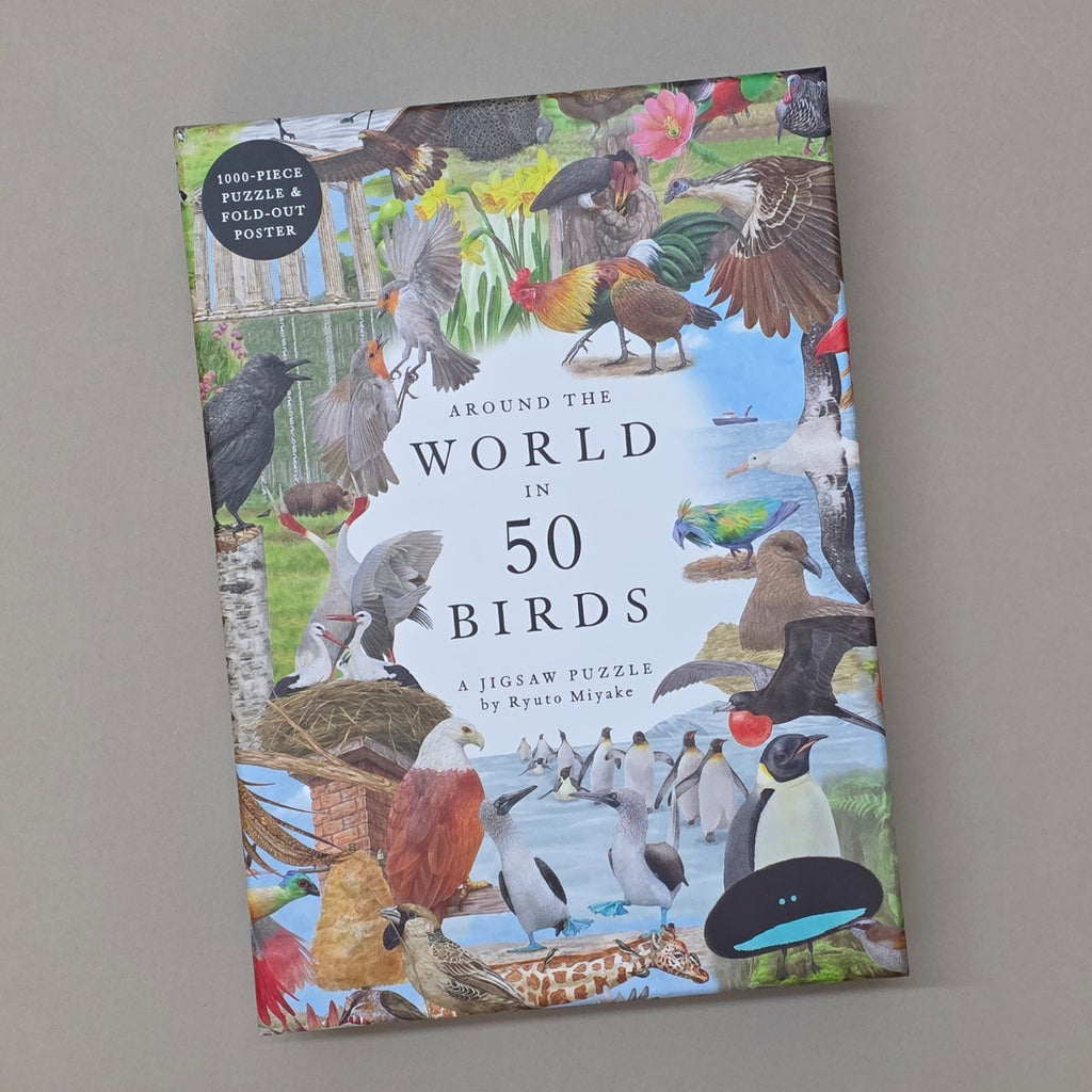 Jigsaw puzzle box featuring various birds from around the world on a grey background