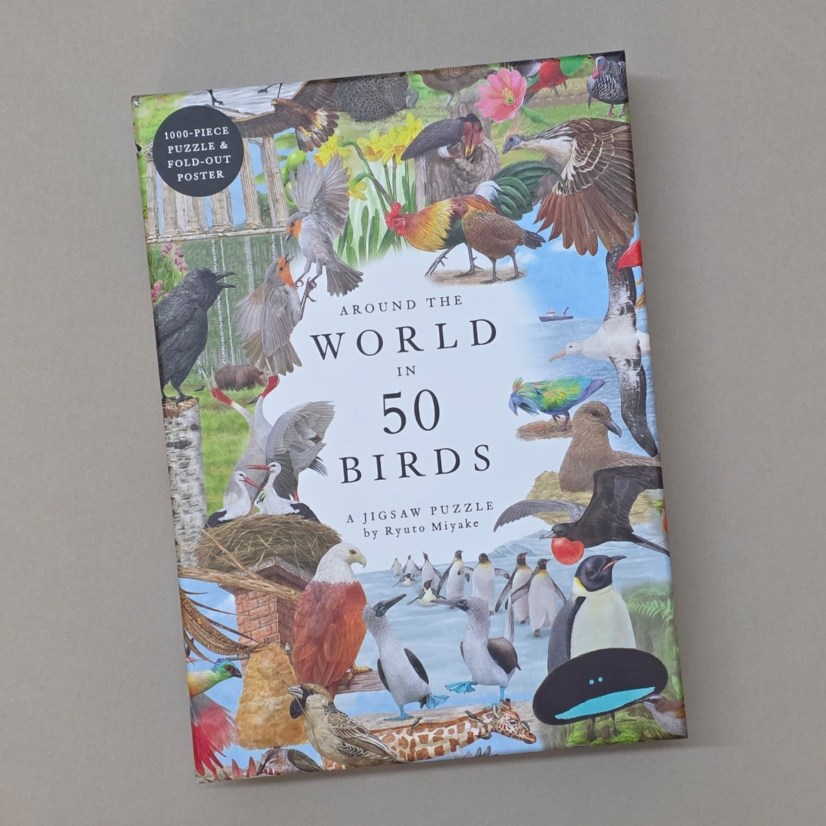 Jigsaw puzzle box featuring various birds from around the world on a grey background