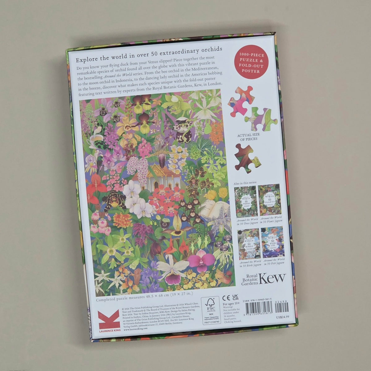 The back of a Kew brand 100-piece jigsaw puzzle box, featuring a colorful illustration of an orchid garden and product details on a light beige background.