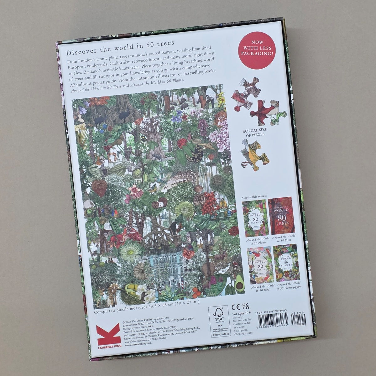 Jigsaw puzzle box with colorful illustrations on a plain background