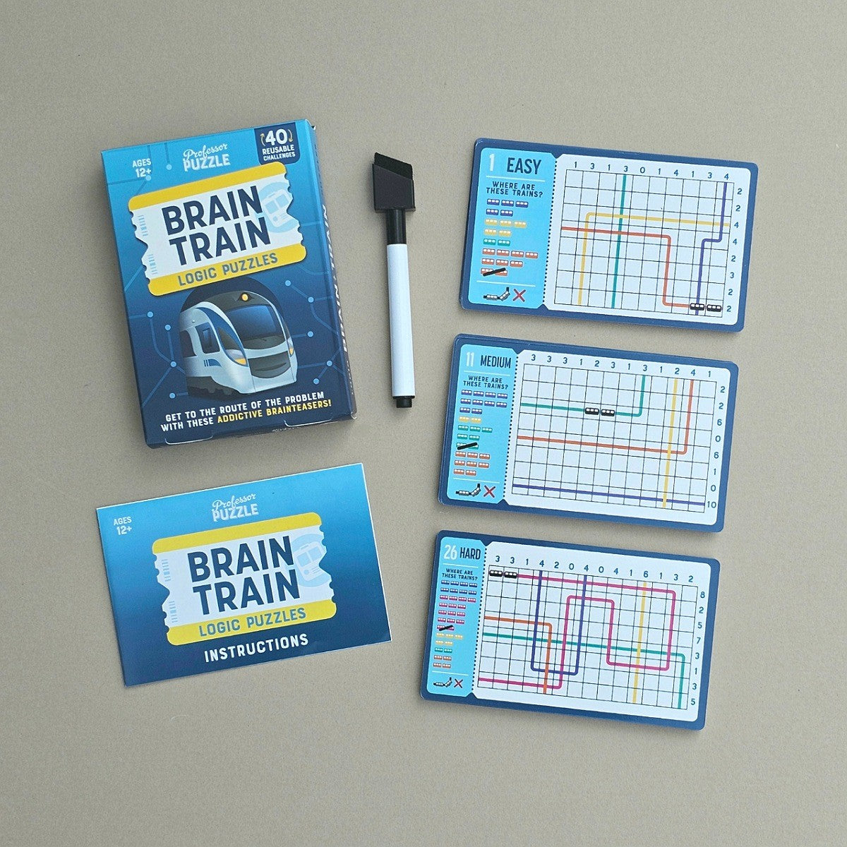 Brain training puzzle set with cards and a marker on a beige background
