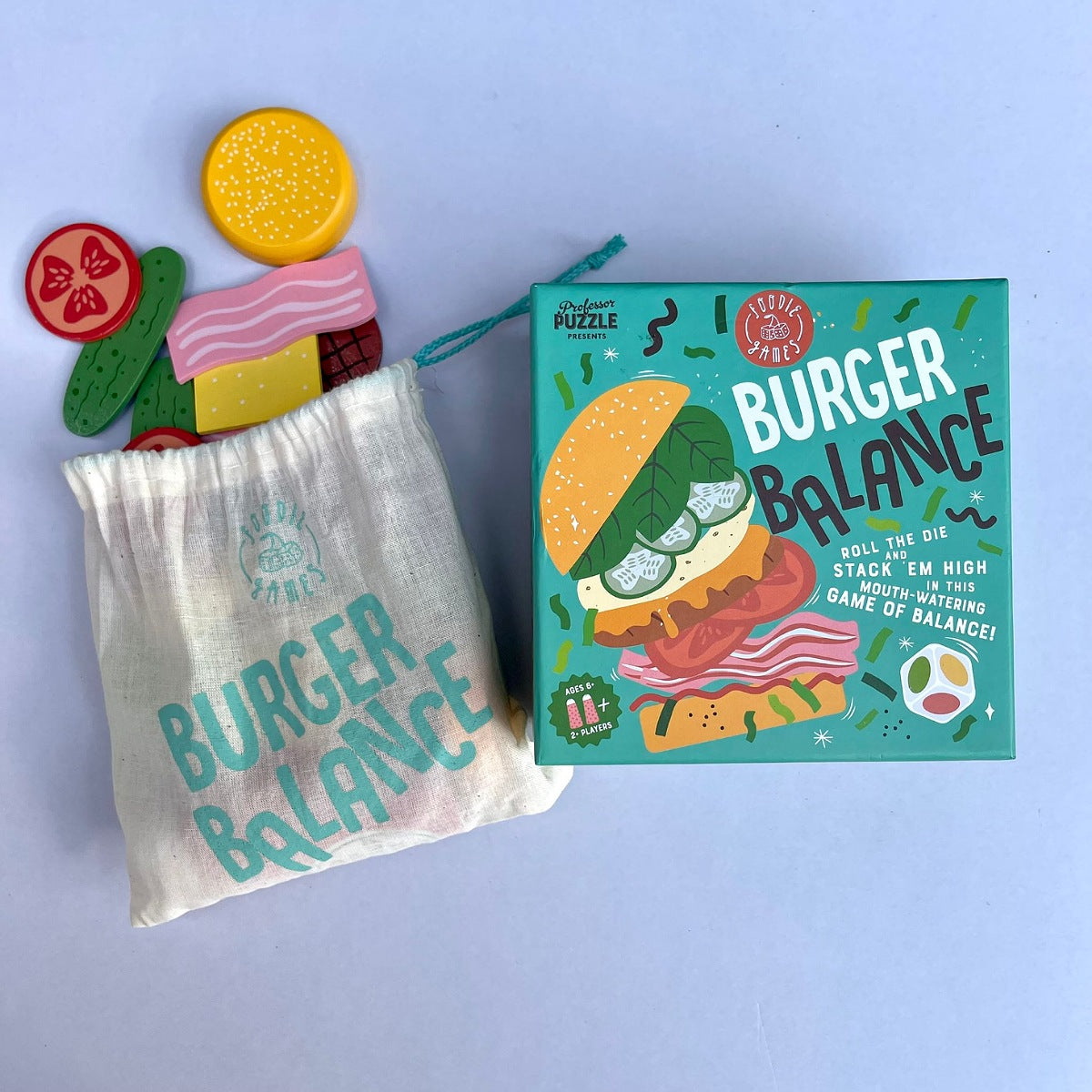 Burger Balance game packaging with components on a light blue background