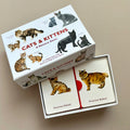 Memory game box with cat and kitten illustrations on a beige background