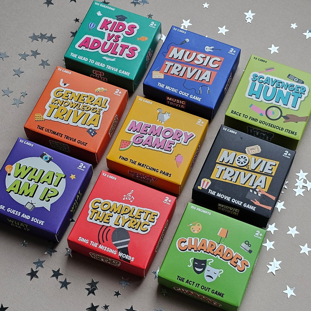 Collection of mini trivia game boxes on a gray background with star decorations.