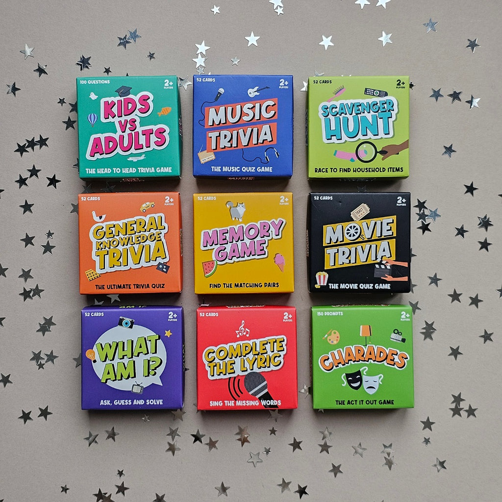 Collection of mini trivia game boxes on a gray background with star decorations.