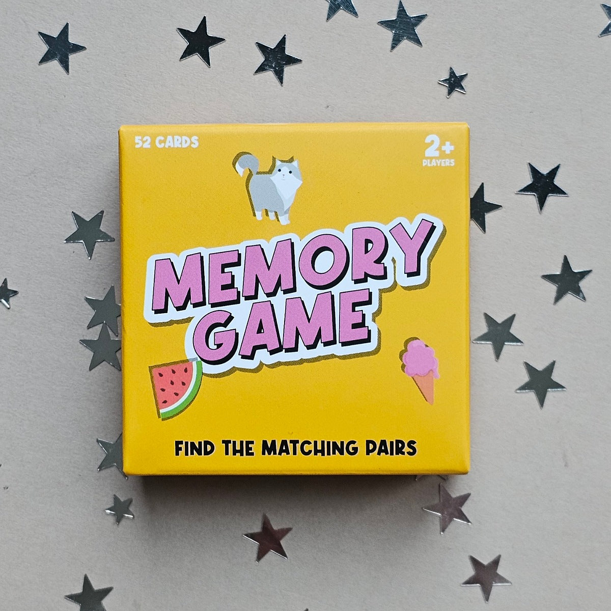 Memory game box with cartoon characters on a star-patterned background