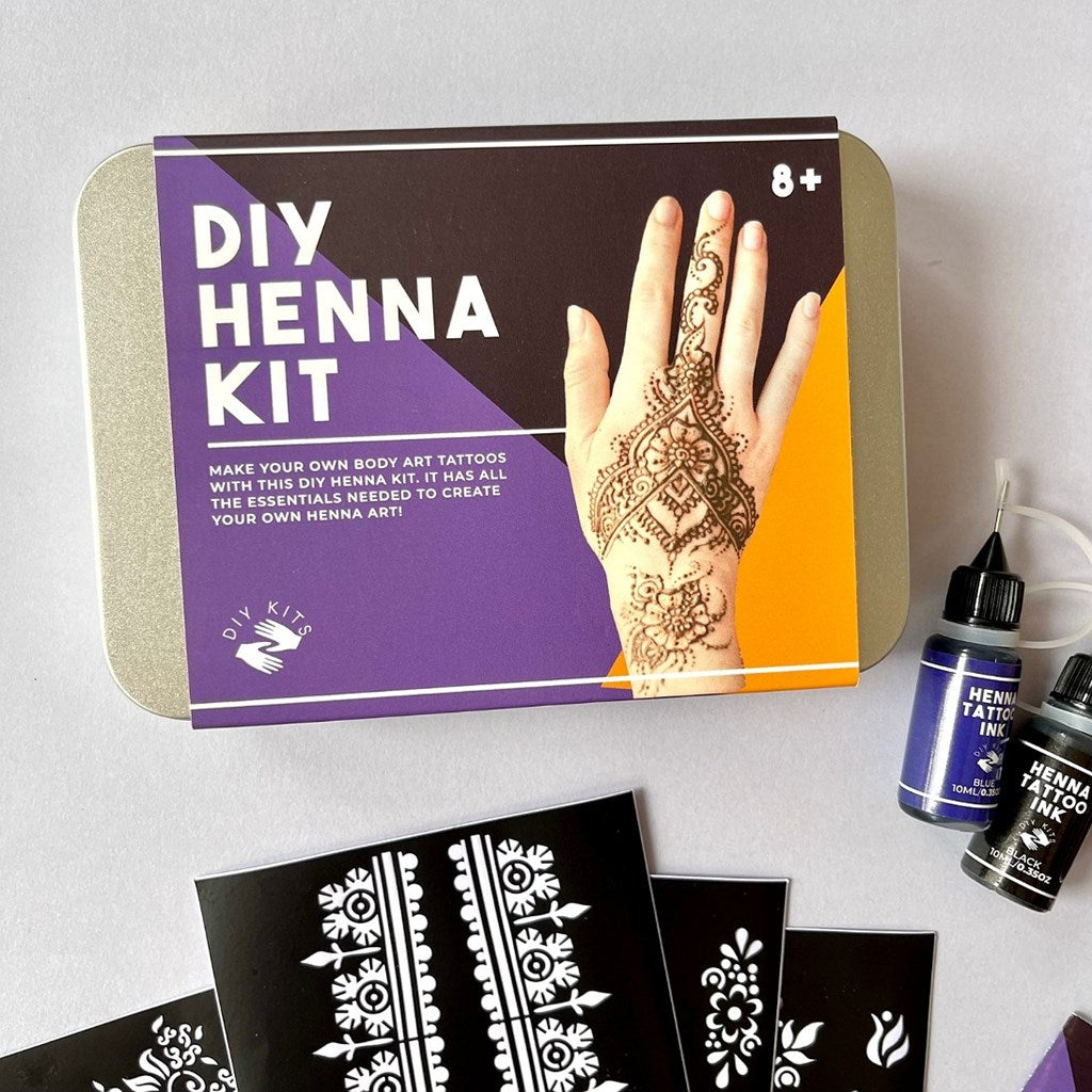DIY Henna Kit with packaging, henna tattoo designs, and ink bottles on a white background