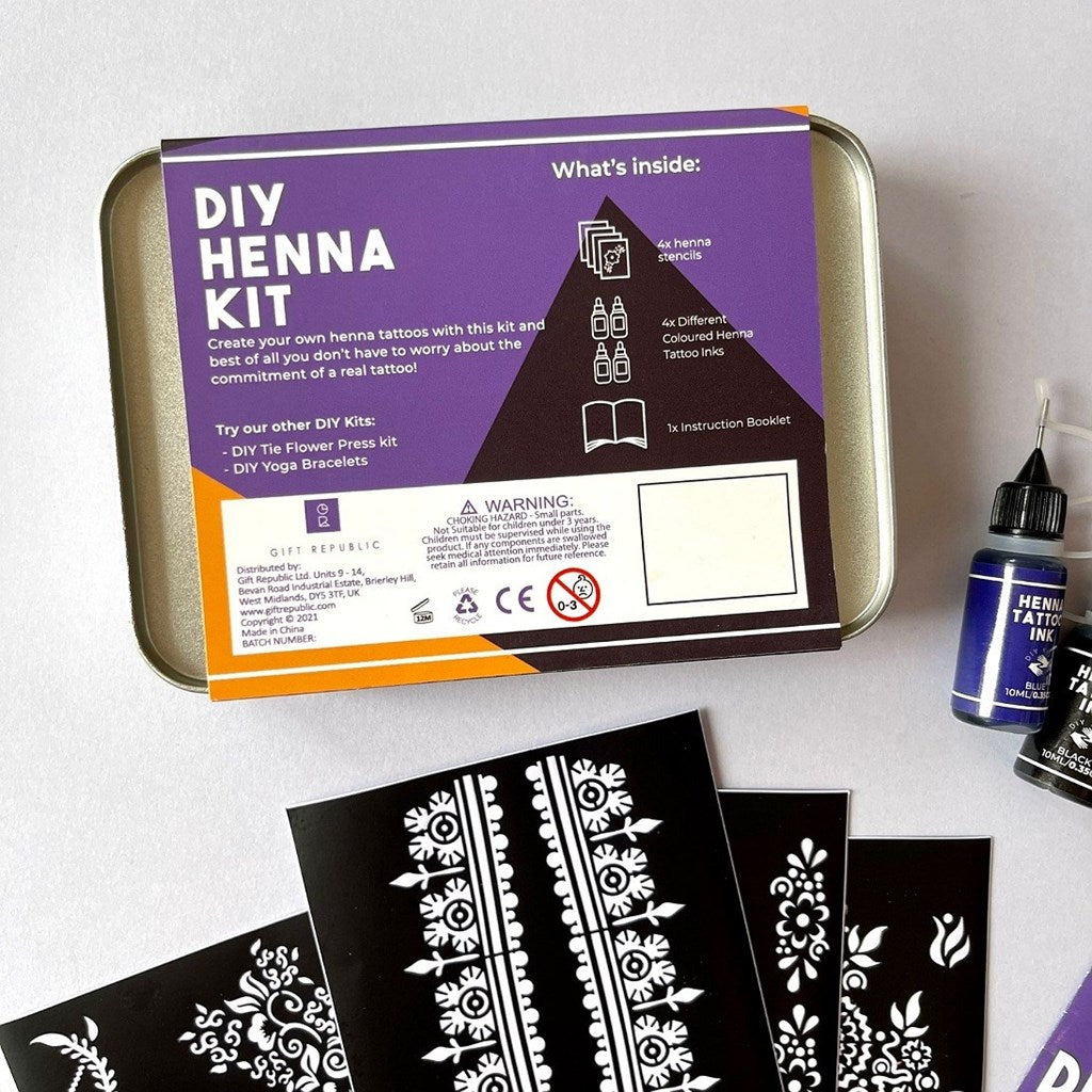 DIY Henna Kit with stencils and ink on a white background