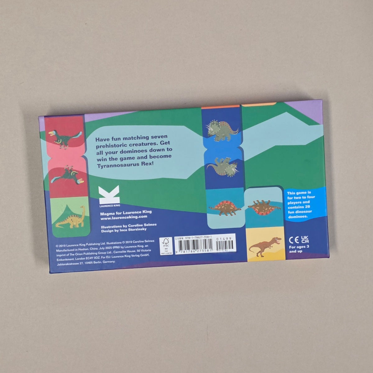 Dinosaur-themed game box with colorful illustrations on a beige background
