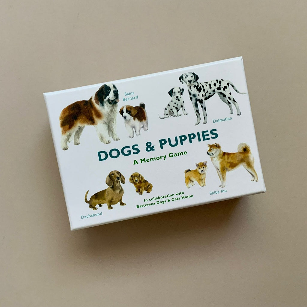 Memory game box featuring images of dogs on a beige background