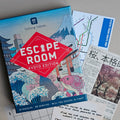 Escape Room Kyoto Edition game box with related materials on a neutral background