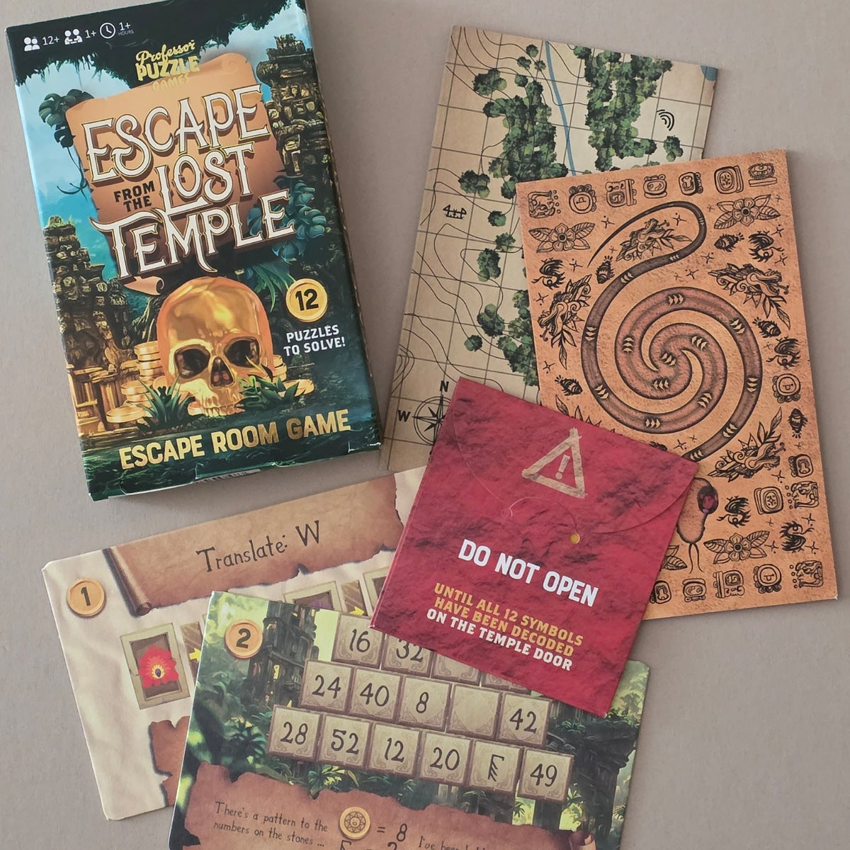 An escape room puzzle game set titled 'Escape from the Lost Temple' shown with its box and several themed cards and boards arranged on a light grey surface.