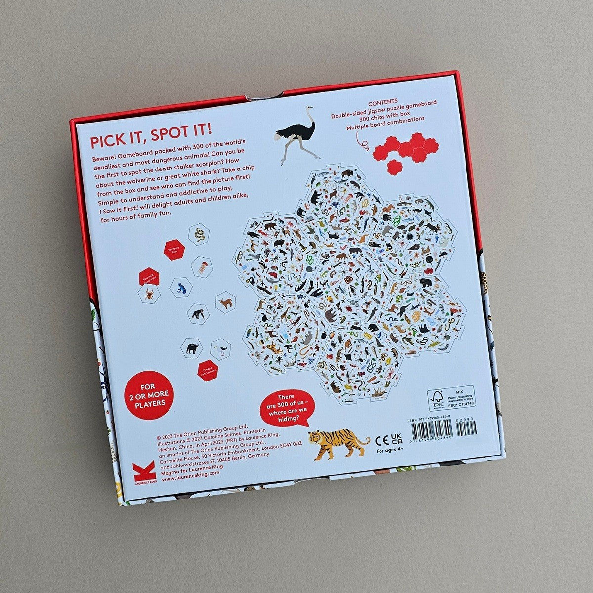 Back of a children's game box with animal illustrations and text on a grey background