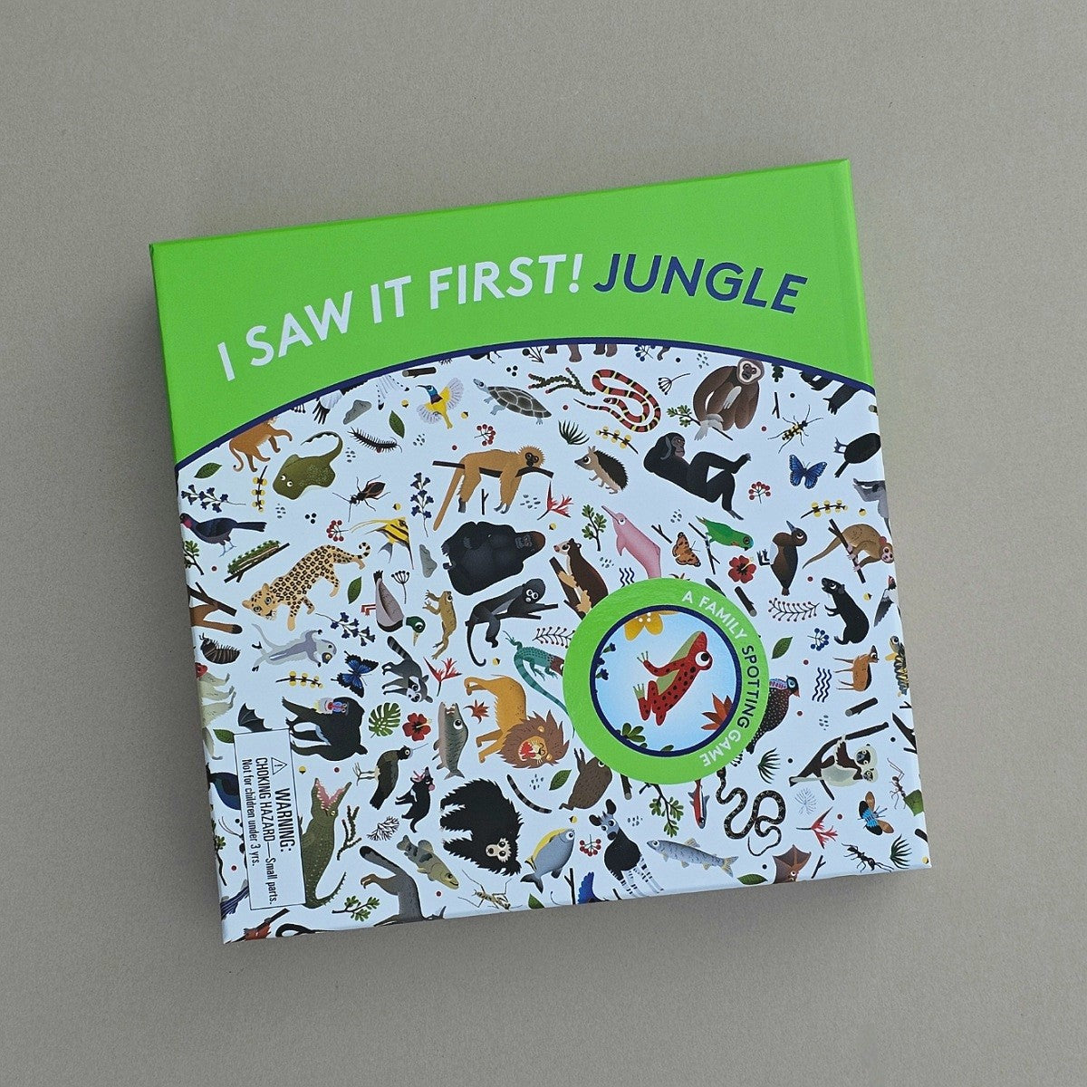 Children's game titled 'I Saw It First! Jungle' with a green and white cover on a grey background