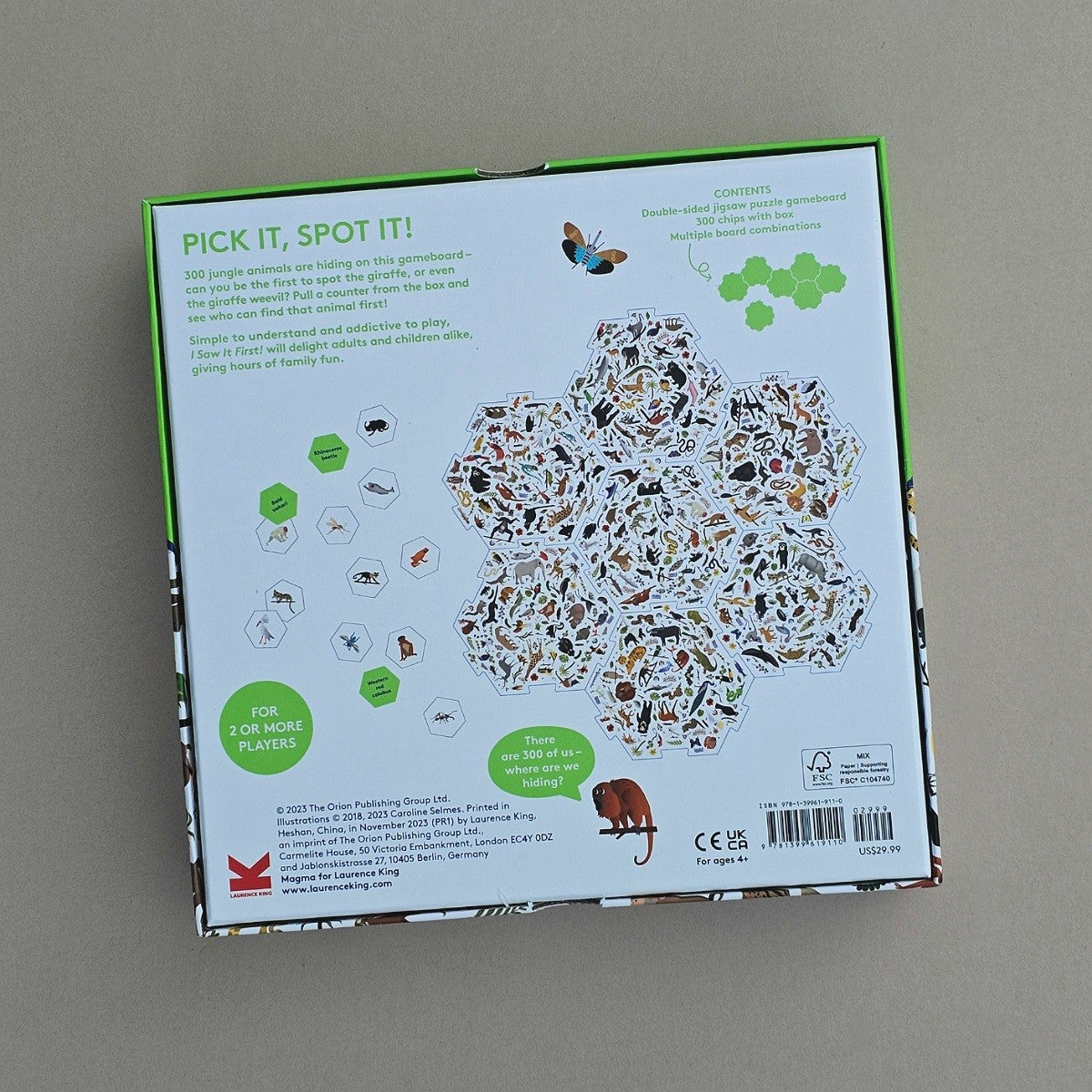 Game box with animal illustrations and text on a grey background