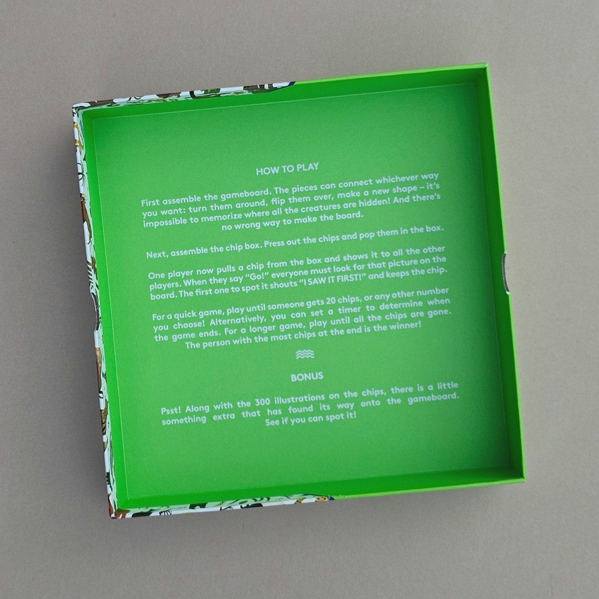 Inside green game box with text 'how to play' on a grey background