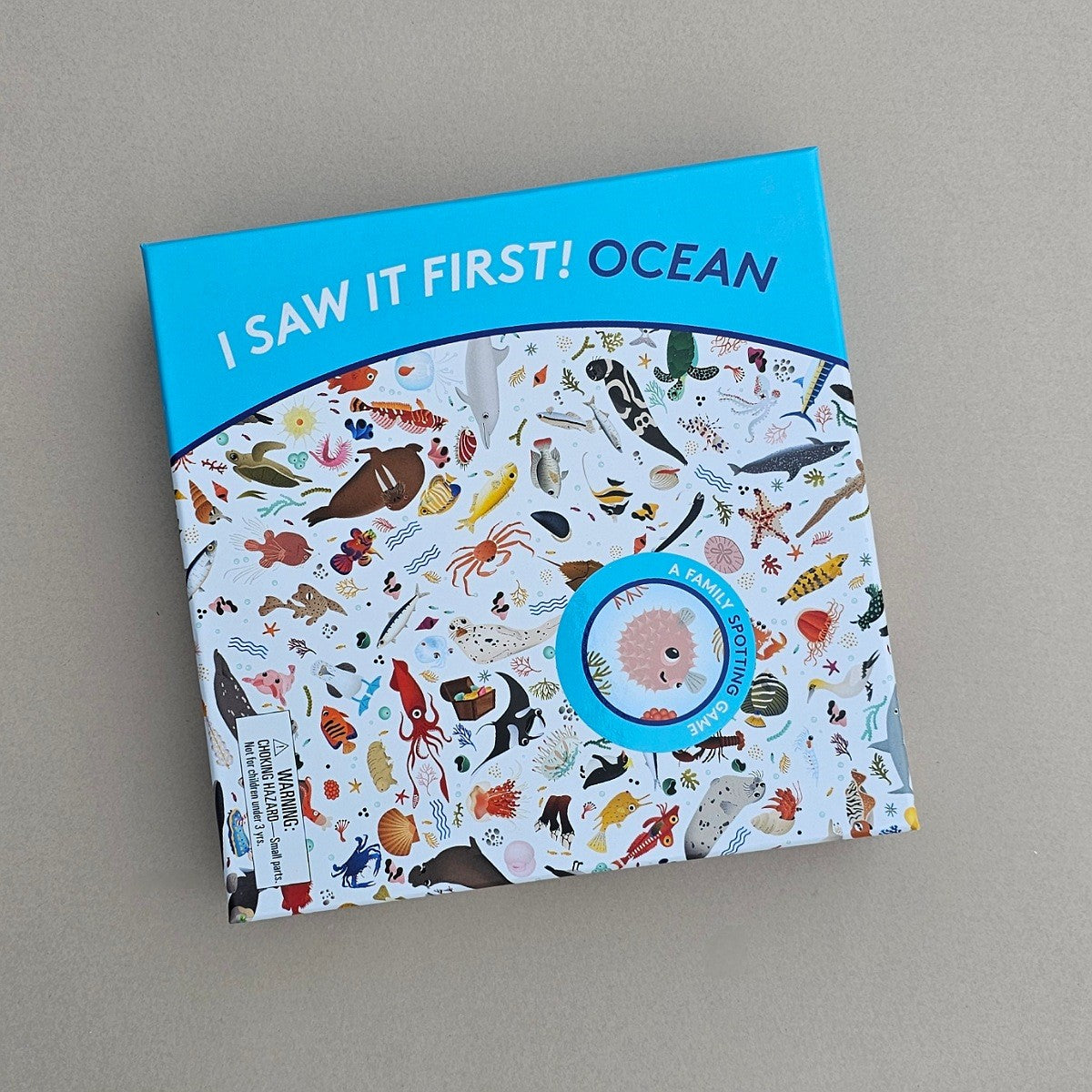 Children's game titled 'I Saw It First! Ocean' with colorful illustrations on a grey background