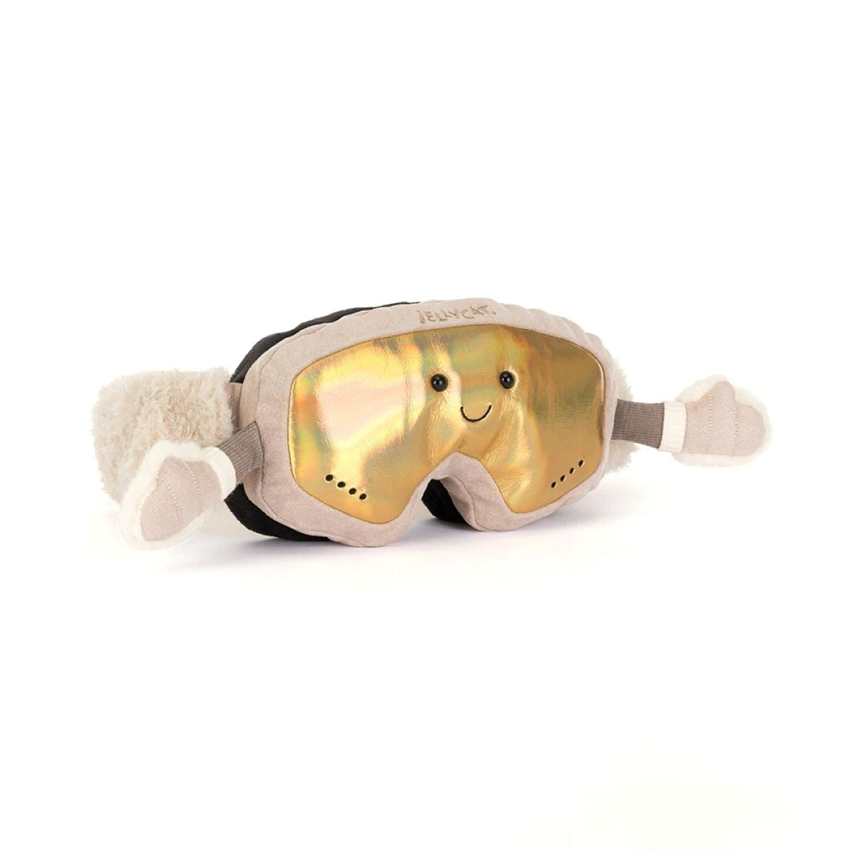 A plush pair of skiing goggles with a gold front with a smiling face.  Two side arms with fluffy mittens on a white background.