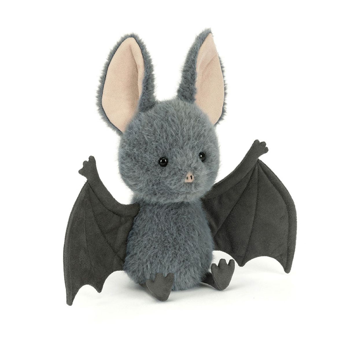 Plush toy bat with gray fur and black wings on a white background