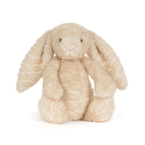 A plush stuffed bunny toy in a soft cream-beige color with long floppy ears, small black eyes, and a tiny pink stitched nose, photographed on a clean white background.