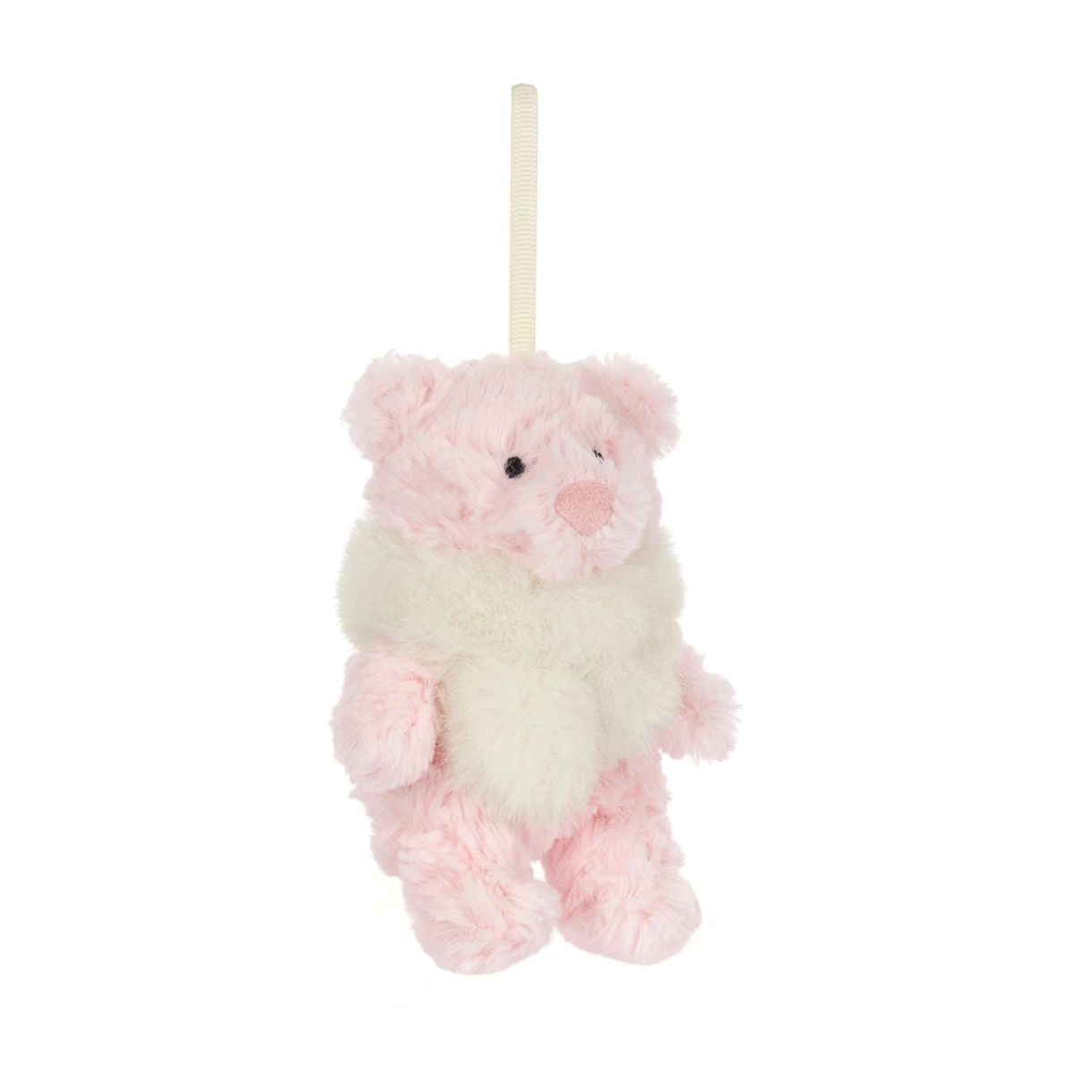 A small plush hanging bear ornament in soft pink and cream white faux fur, suspended by a cream ribbon on a plain white background.
