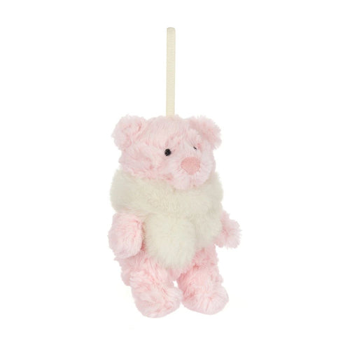 A small plush hanging bear ornament in soft pink and cream white faux fur, suspended by a cream ribbon on a plain white background.