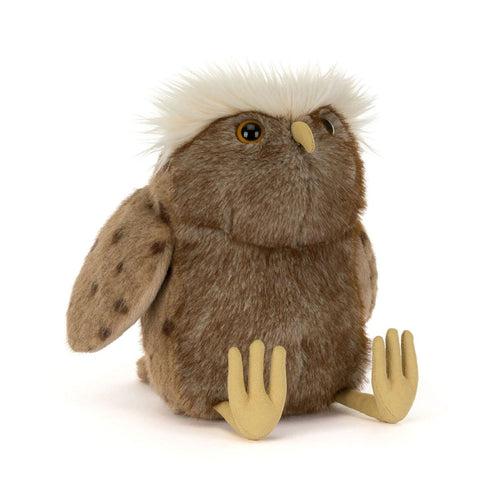 A brown plush owl toy with cream-colored feet and beak, a fluffy white crest on its head, and brown spotted wings, photographed on a clean white background.