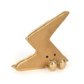A plush gold lightning bolt-shaped figurine with a smiling face on a white background