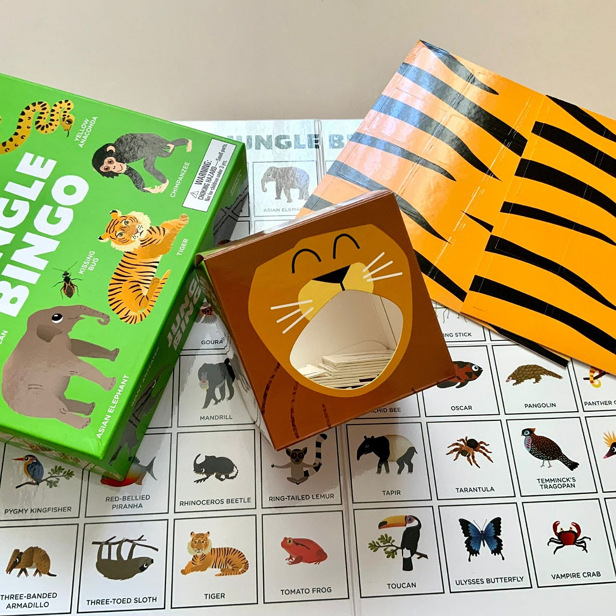 Children's animal-themed board game with a tiger design on a white surface