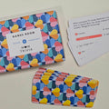 Colorful card game box with 'Games Room' branding and titled 'Mum Trivia' with patterned cards on a light background