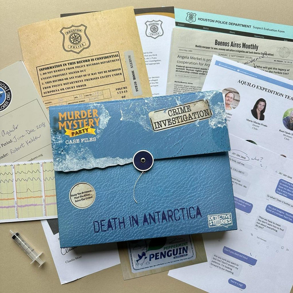 Blue 'Death in Antarctica' mystery party case with investigation and crime files on a table.