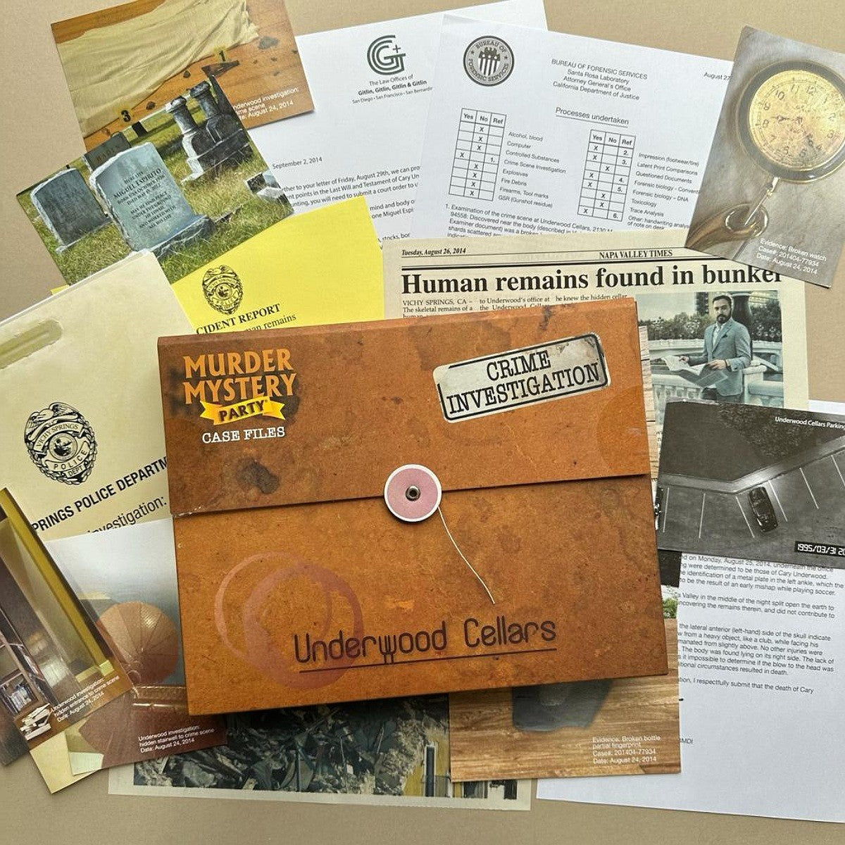 A themed mystery file box labeled 'Murder Mystery Part 1 Case Files Underwood Cellars' surrounded by fake investigation documents and clippings on a beige surface.