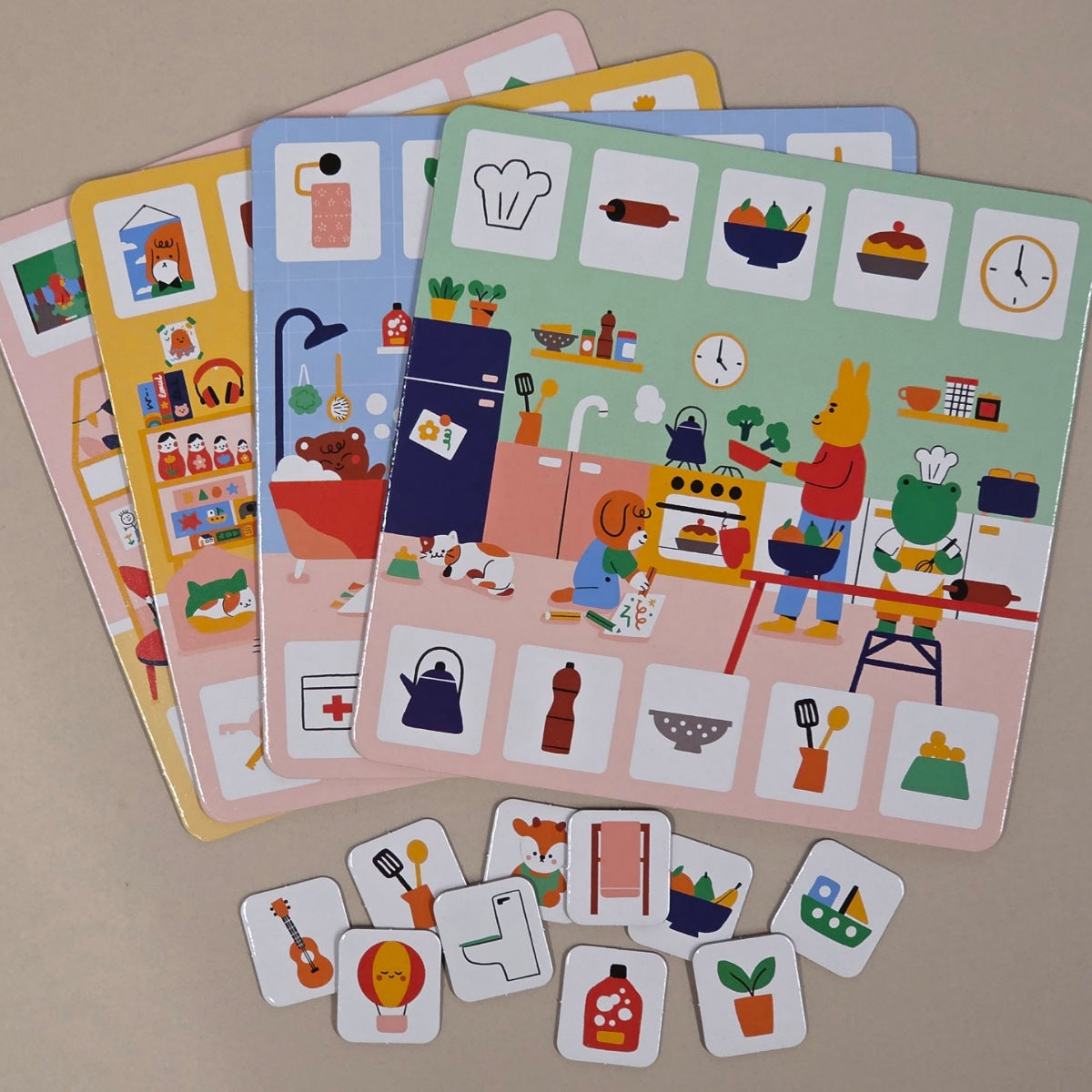 Educational children's cards with illustrations of a kitchen scene and various objects on a beige background.