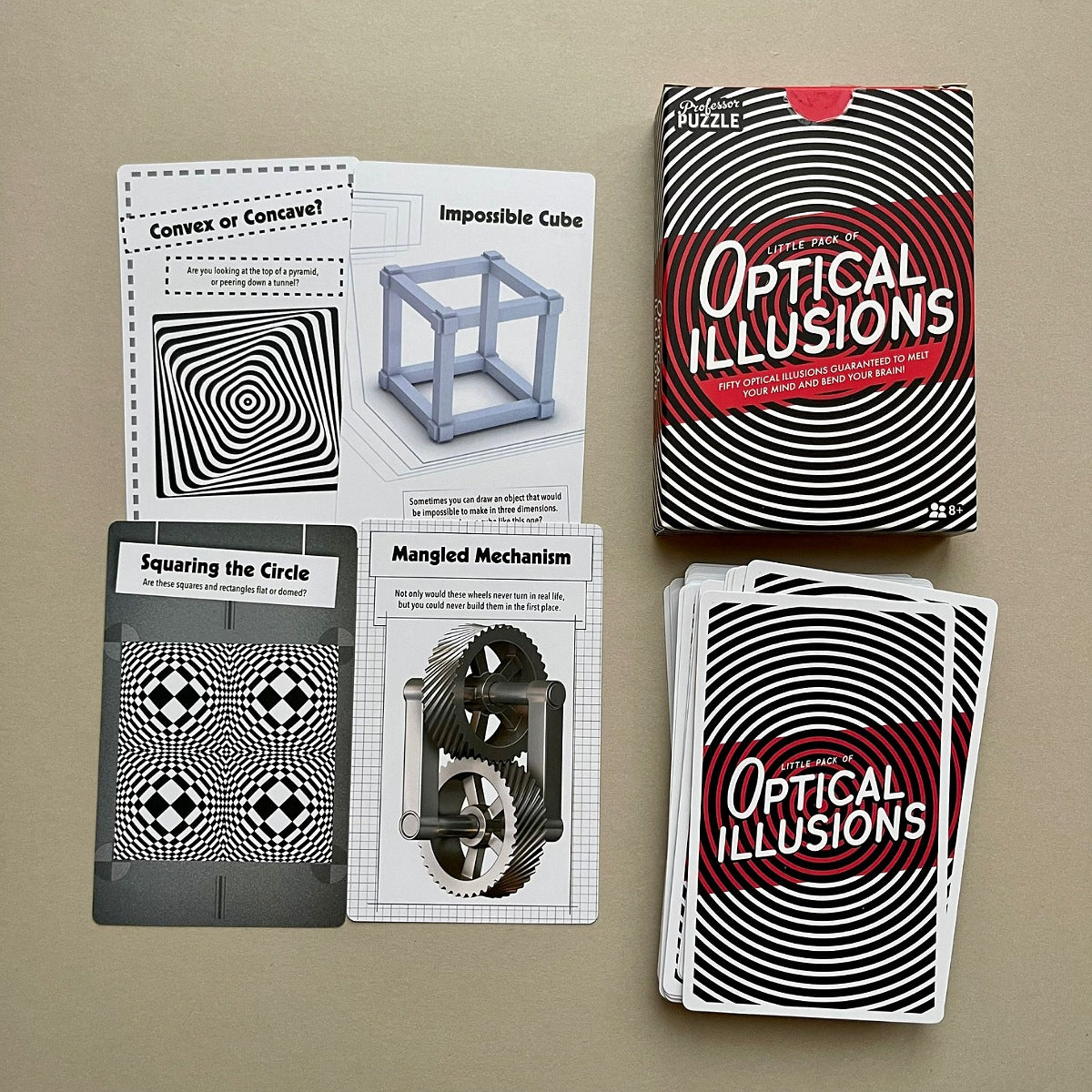 Optical illusions card set with cards showing and packaging on a beige background