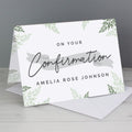 Greeting card with 'On Your Confirmation' text and green leaf patterns on a gray background
