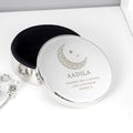 Silver jewelry box with engraved message on a white background