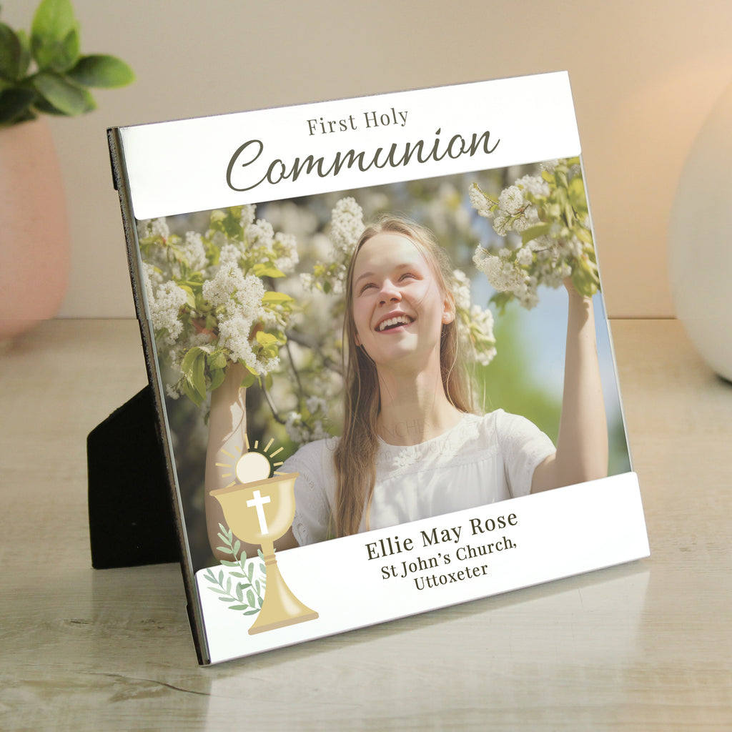 Personalized 'First Holy Communion' photo plaque with a young girl smiling outdoors.