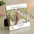 Personalized 'First Holy Communion' photo plaque with a young girl smiling outdoors.