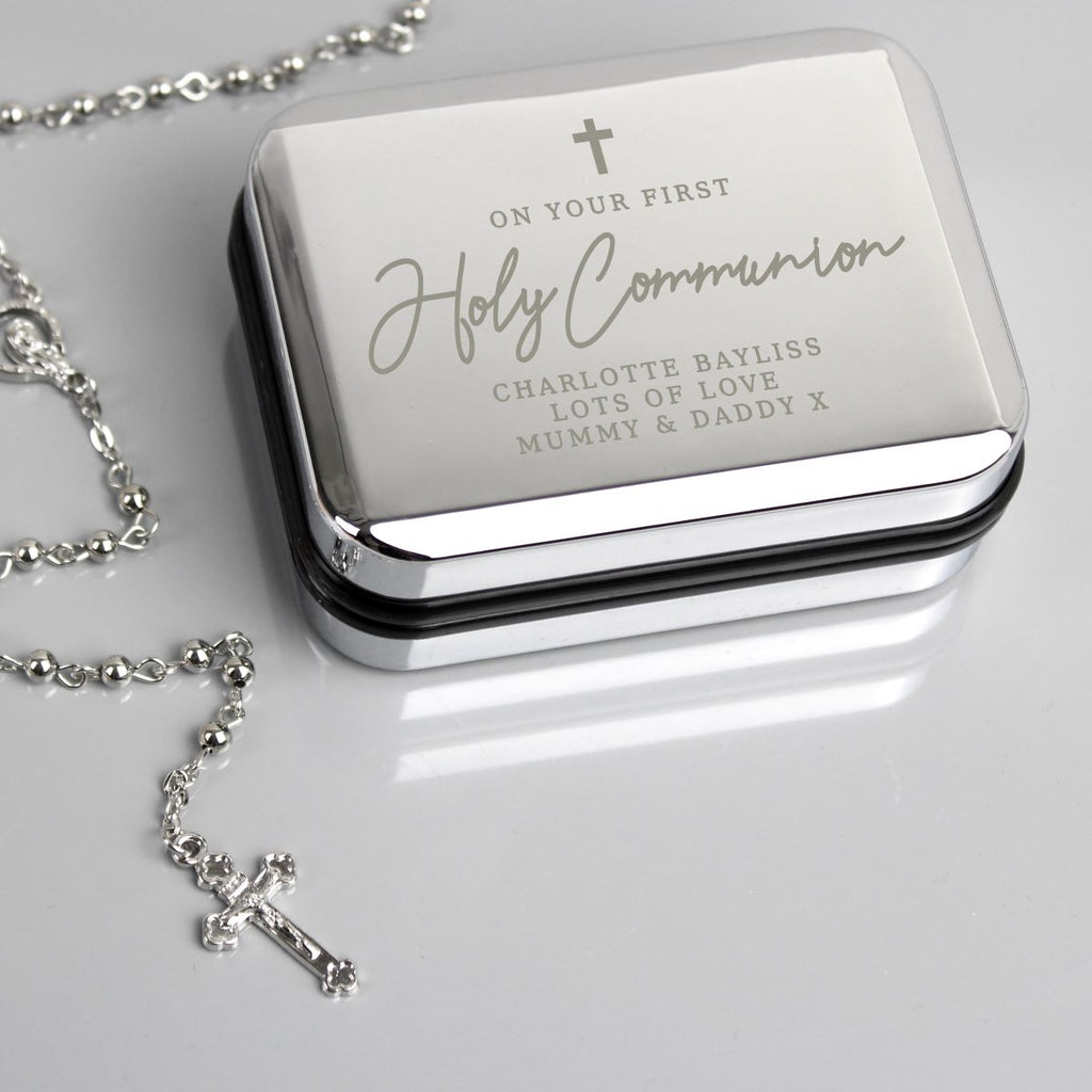 Silver jewelry box with engraved text and a matching necklace on a light gray background
