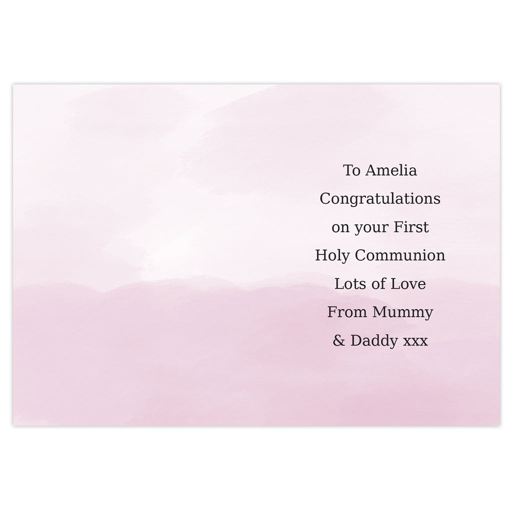 Pink card with black text congratulating Amelia on her First Holy Communion.