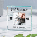 A clear glass  keepsake plaque engraved with 'Best Friends' and 'ME & SIMBA' with black paw prints, featuring a custom photo of a cat and lady, displayed on a marble surface.