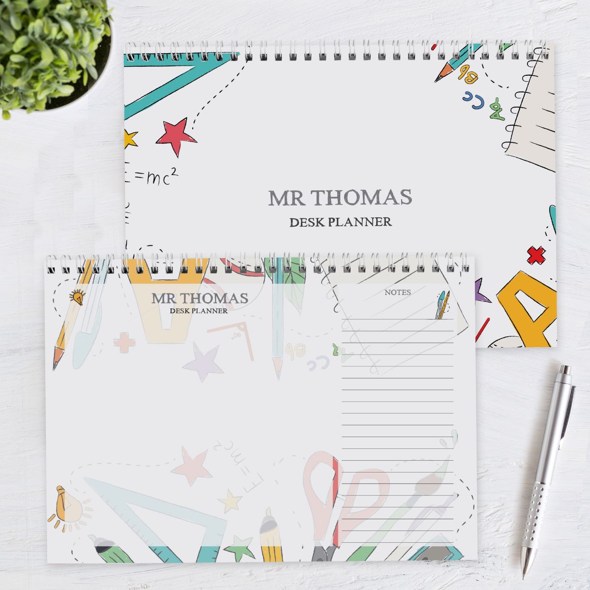 MR THOMAS desk planner with colorful design on a white surface