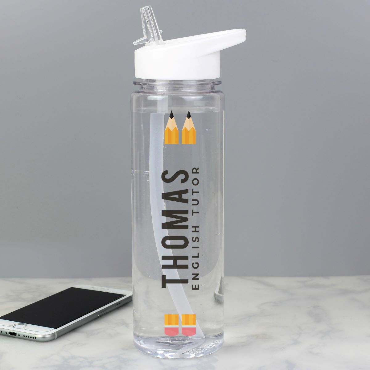 Clear water bottle with 'Thomas English Tutor' branding on a gray background