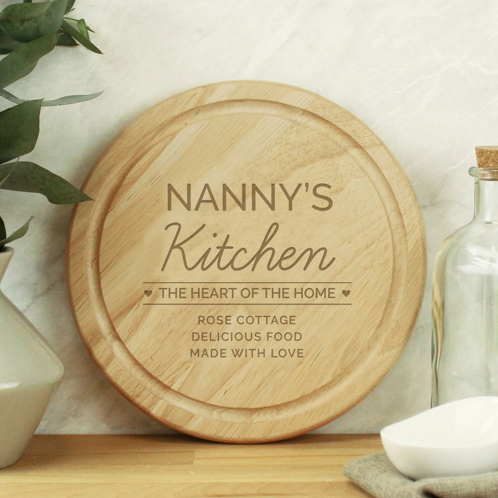 Wooden cutting board with engraved text in a kitchen setting