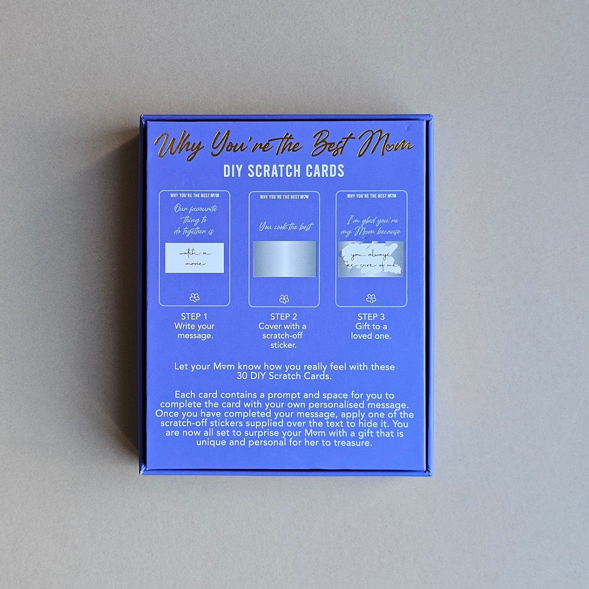 Blue box of DIY scratch cards with text on a grey background