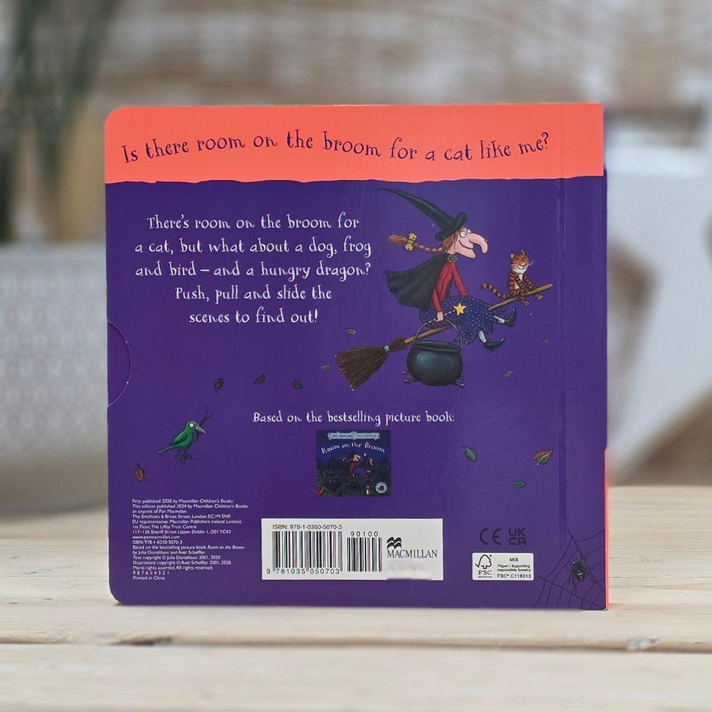 The reverse of a book titled 'Room on a Broom' by Julia Donaldson. Picture of a witch on a broomstick with her black cat.