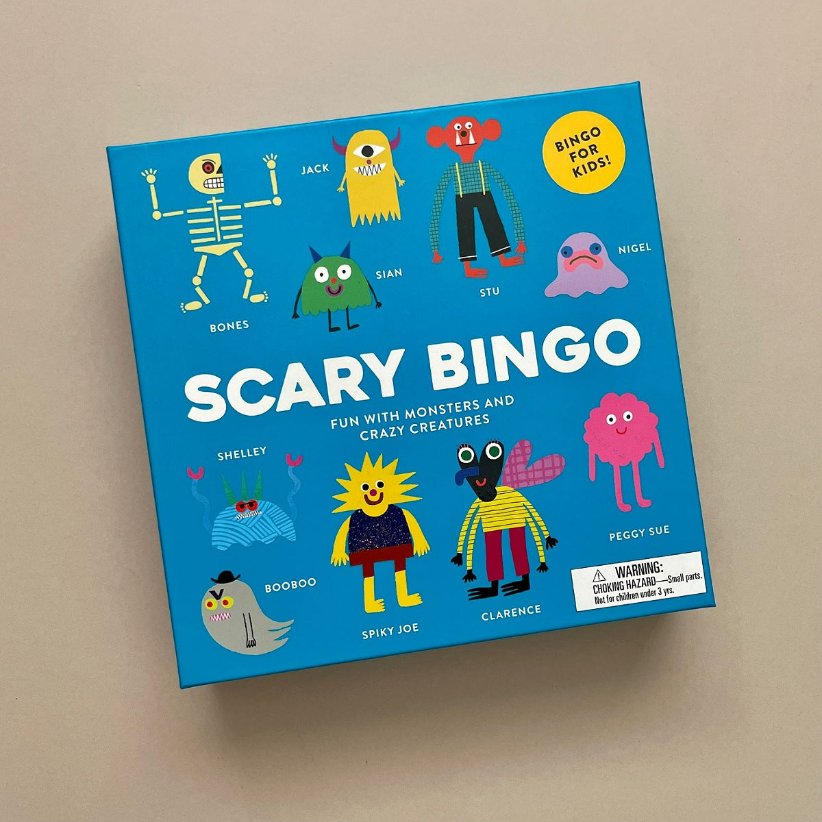 Scary Bingo game box with colorful monster illustrations on a beige background
