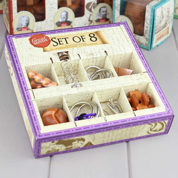 Set of 8 puzzles items in a decorative box with visible brand name 'Great Minds'.