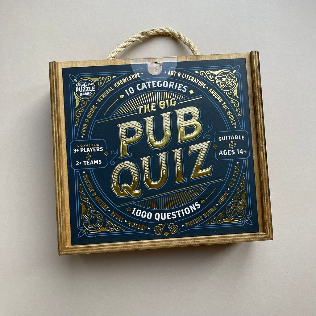 Wooden box with rope handle titled 'The Big Pub Quiz' on a light  background