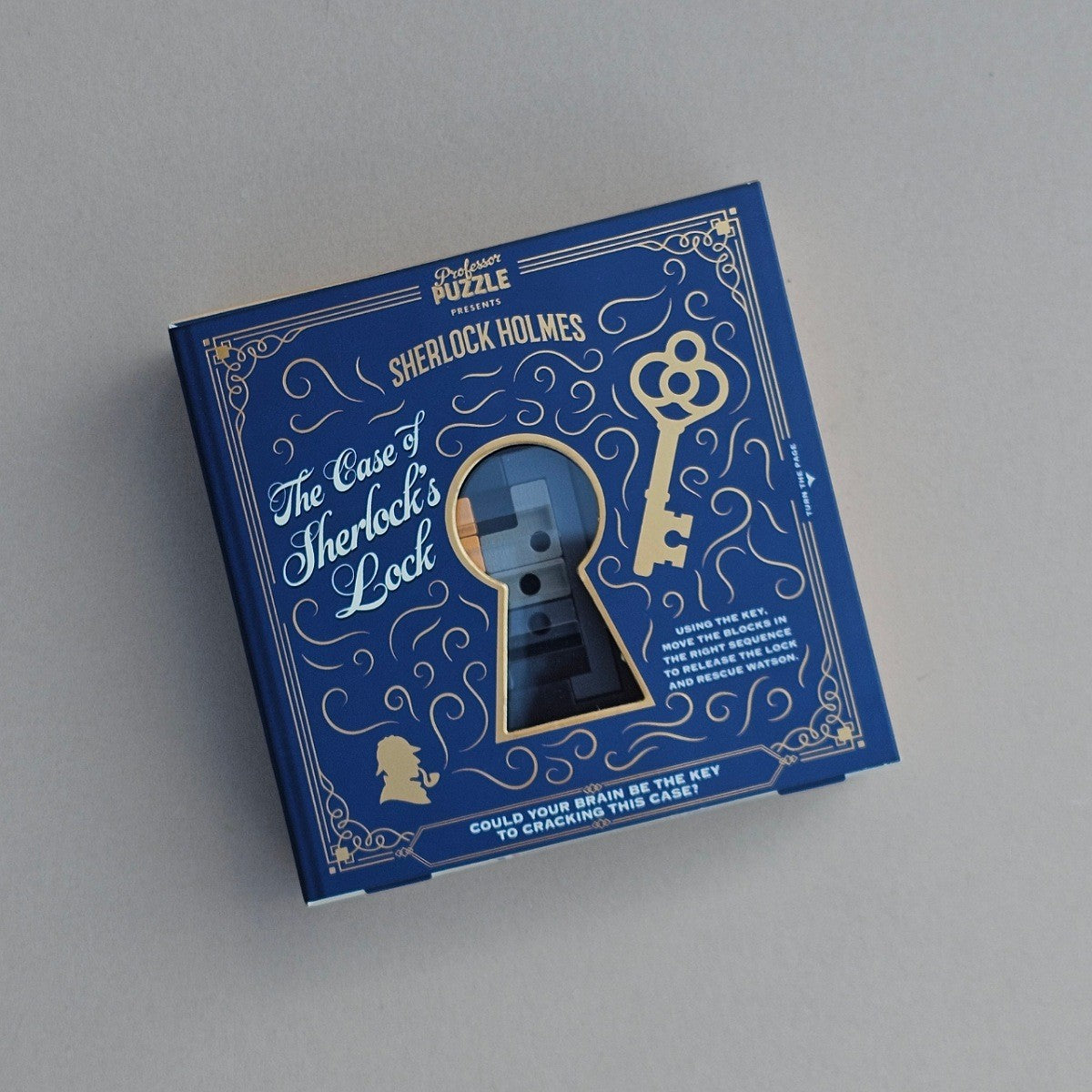 Blue box with gold accents featuring Sherlock Holmes puzzle design on a grey background